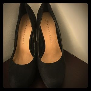 Black suede pumps